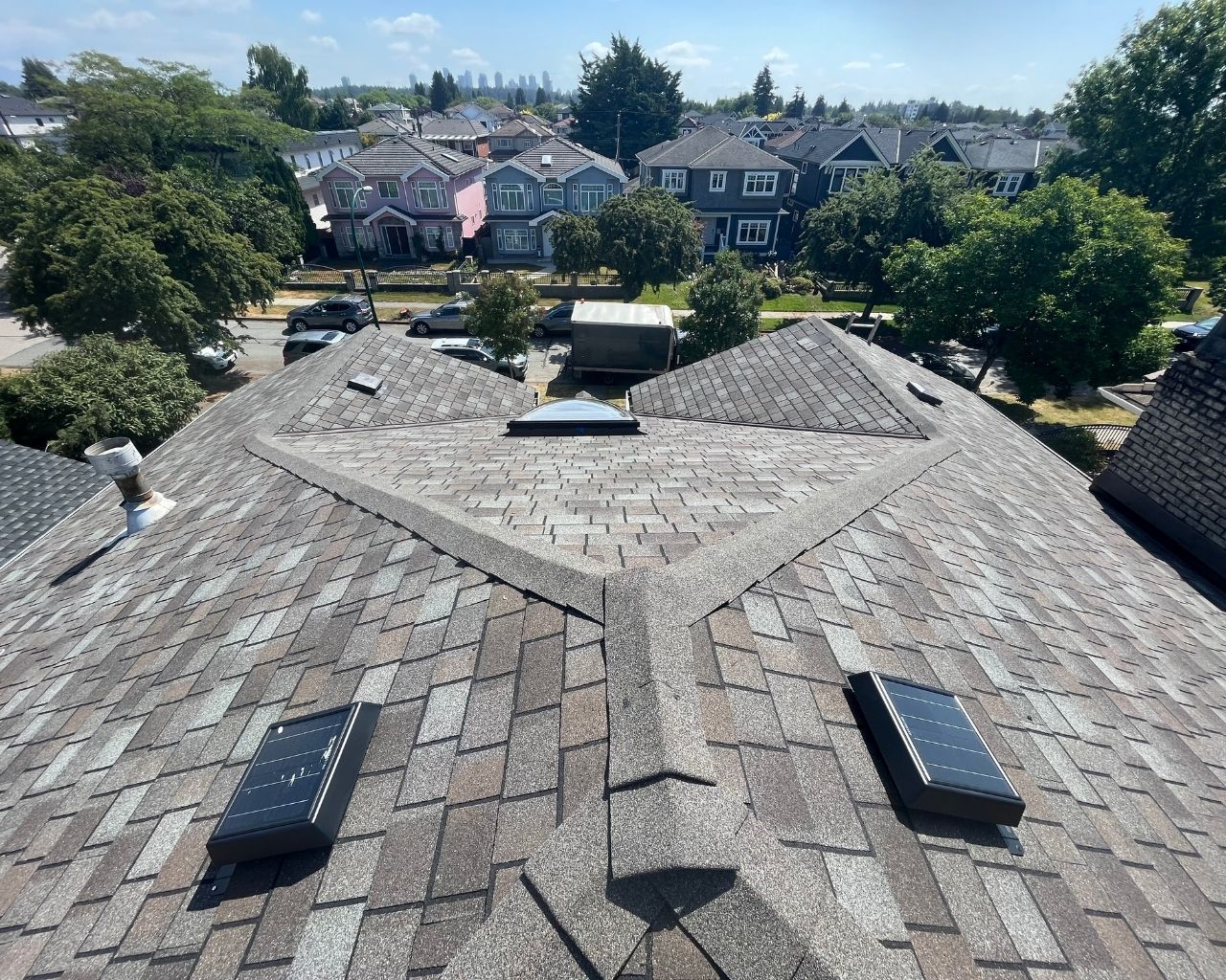 Scarlet Roofing & Gutters crew member performing a roof inspection