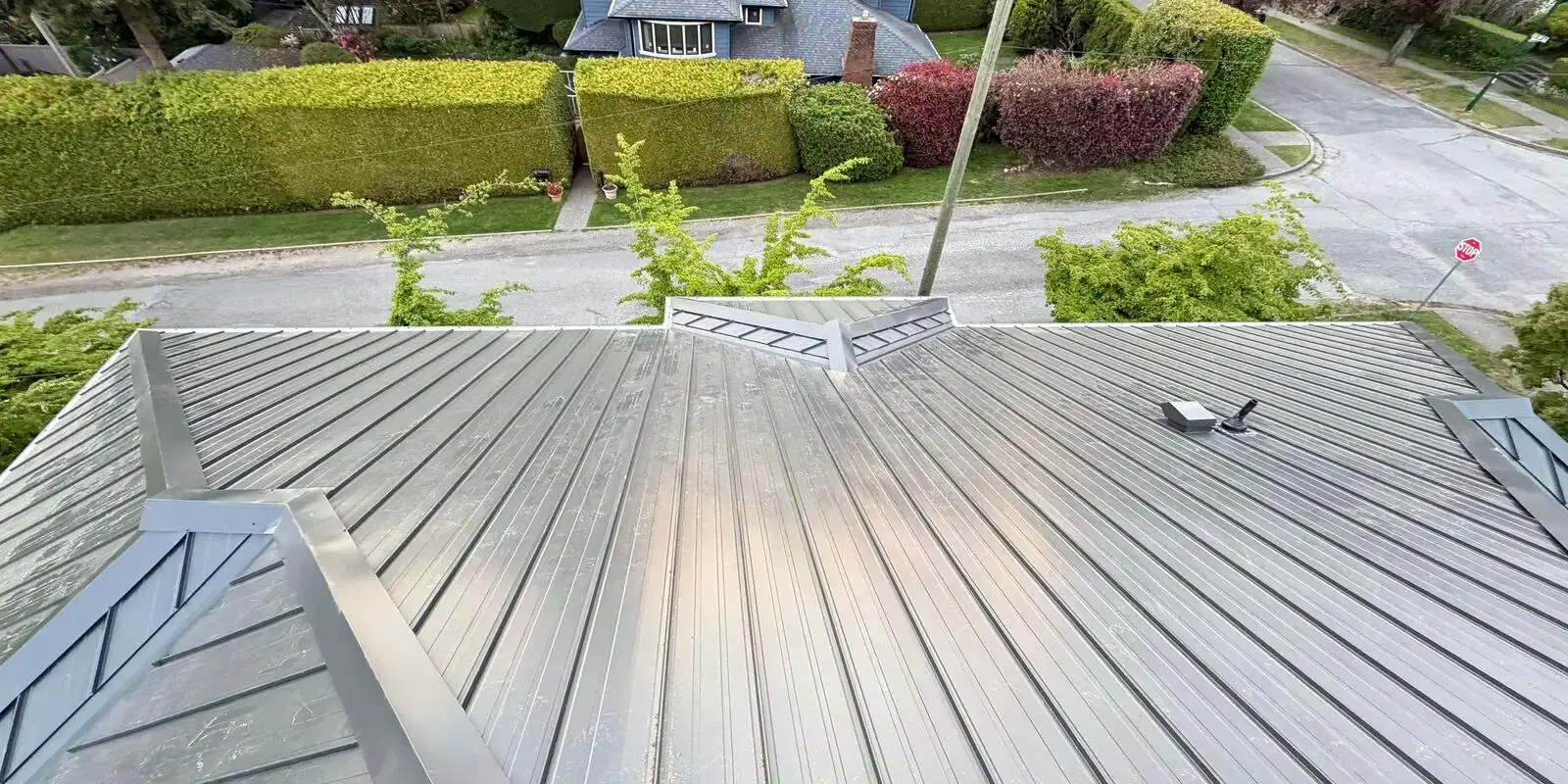 New seamless gutter and leaf guard system installed on a home in Coquitlam, BC