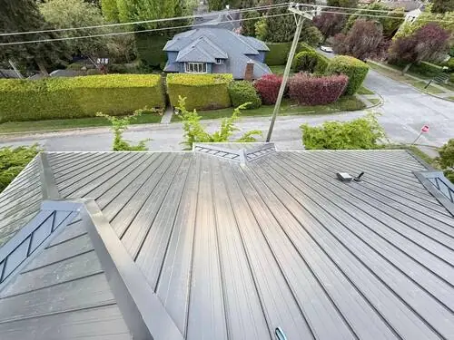 Gutter & Leaf Guard Install — Gutter and downspout run along the fascia.
