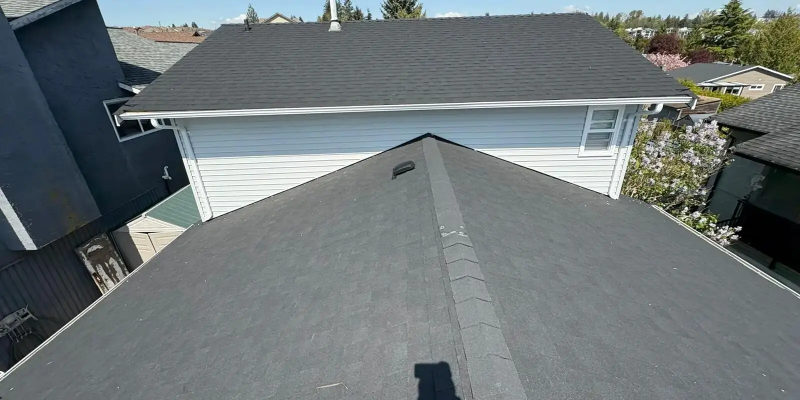 Aerial view of two newly replaced skylights on a roof in Surrey, BC