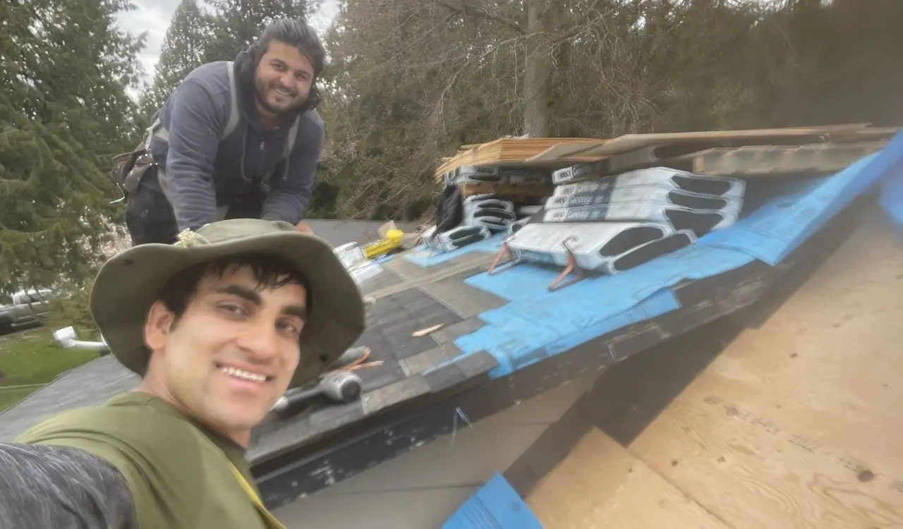 Licensed roof inspection in progress by Scarlet Roofing & Gutters