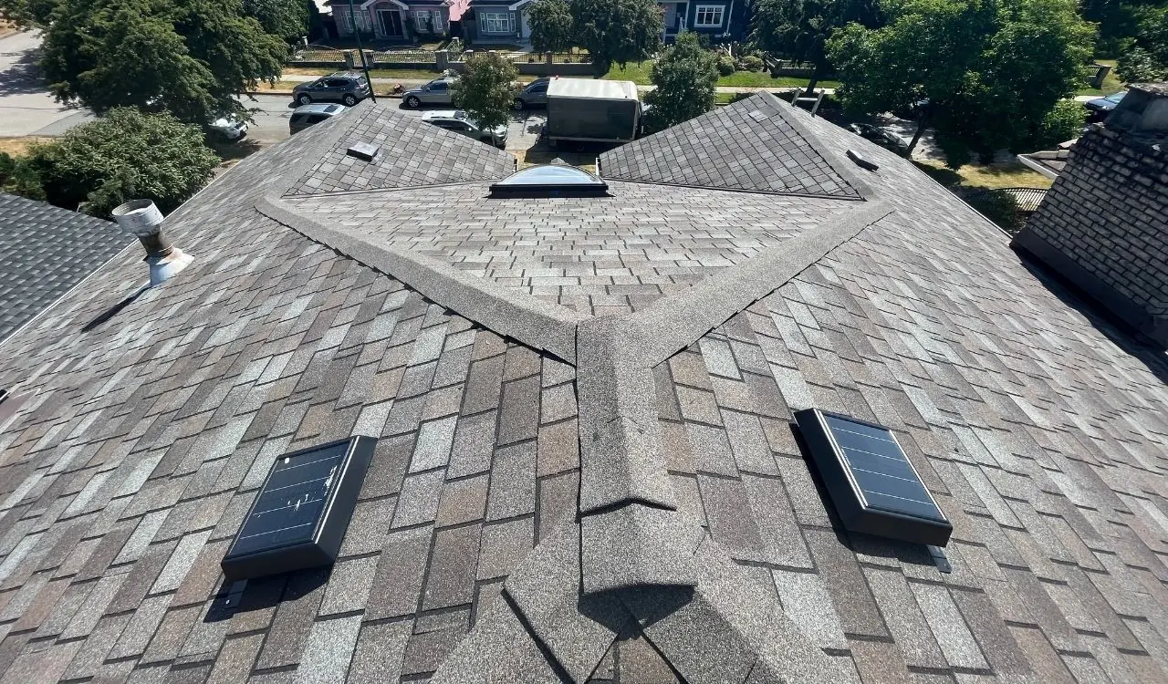 Skylight replacement with new flashing by Scarlet Roofing & Gutters